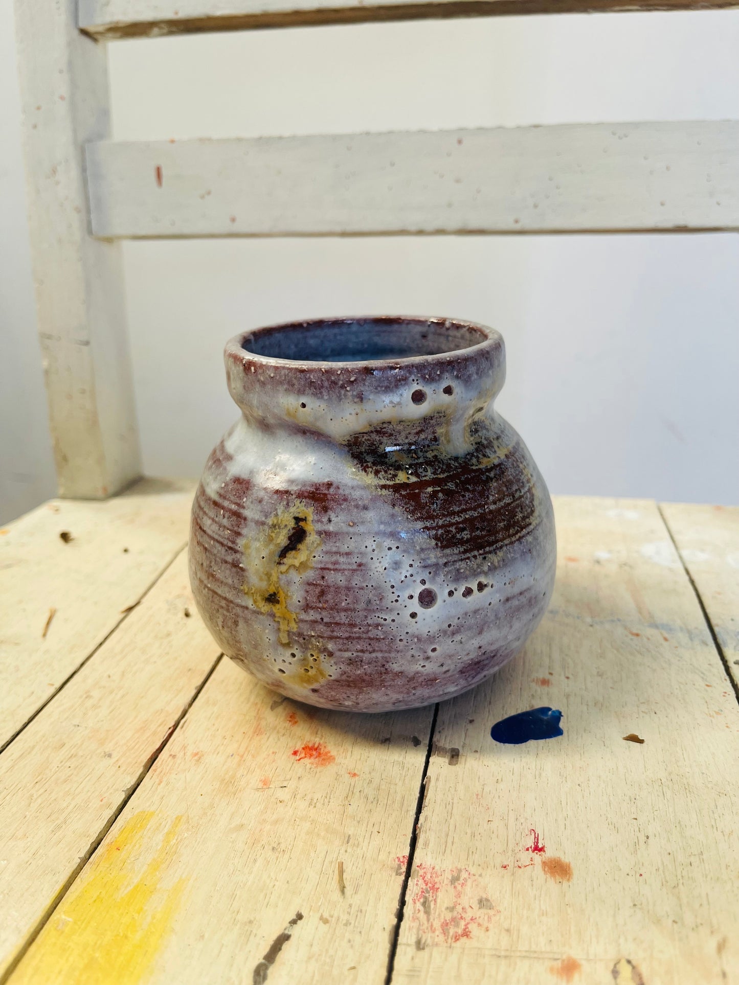 Milky pottery vase