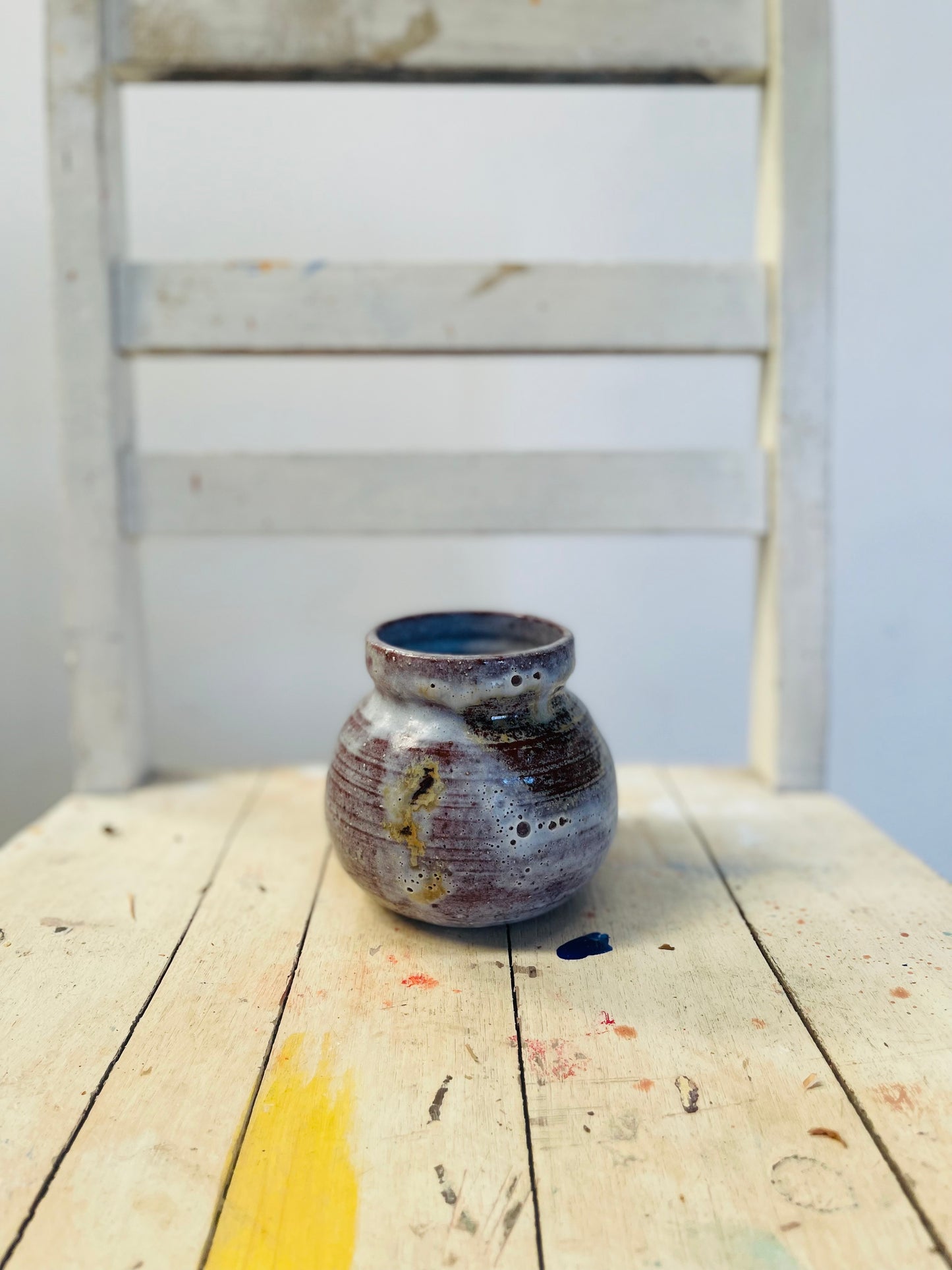 Milky pottery vase